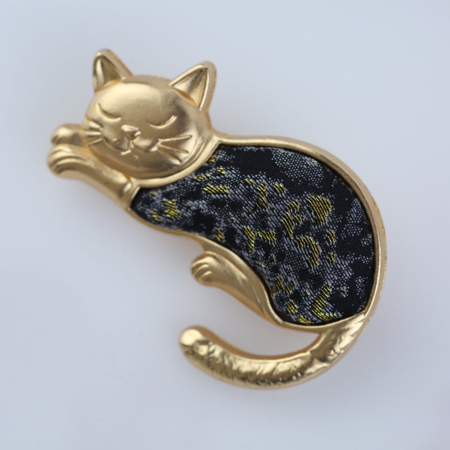 Lucky vintage black cat brooch with elegant Song brocade detail, symbol of good fortune and elegance.