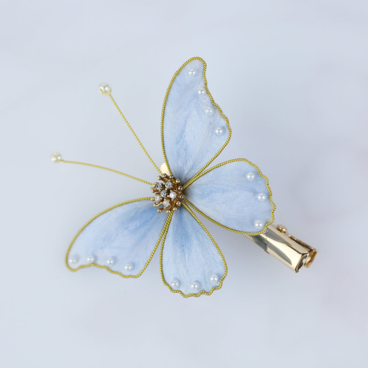Handmade statement light blue butterfly hair clip